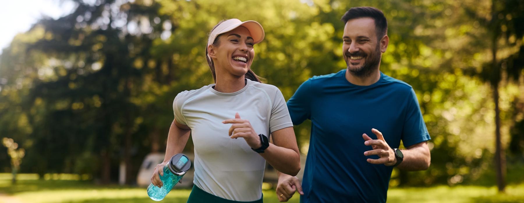 a man and woman running