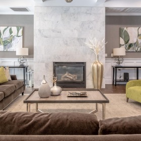Access to resident-only features a room with a fireplace and couches