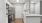a kitchen with white cabinets