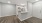 a kitchen with white cabinets
